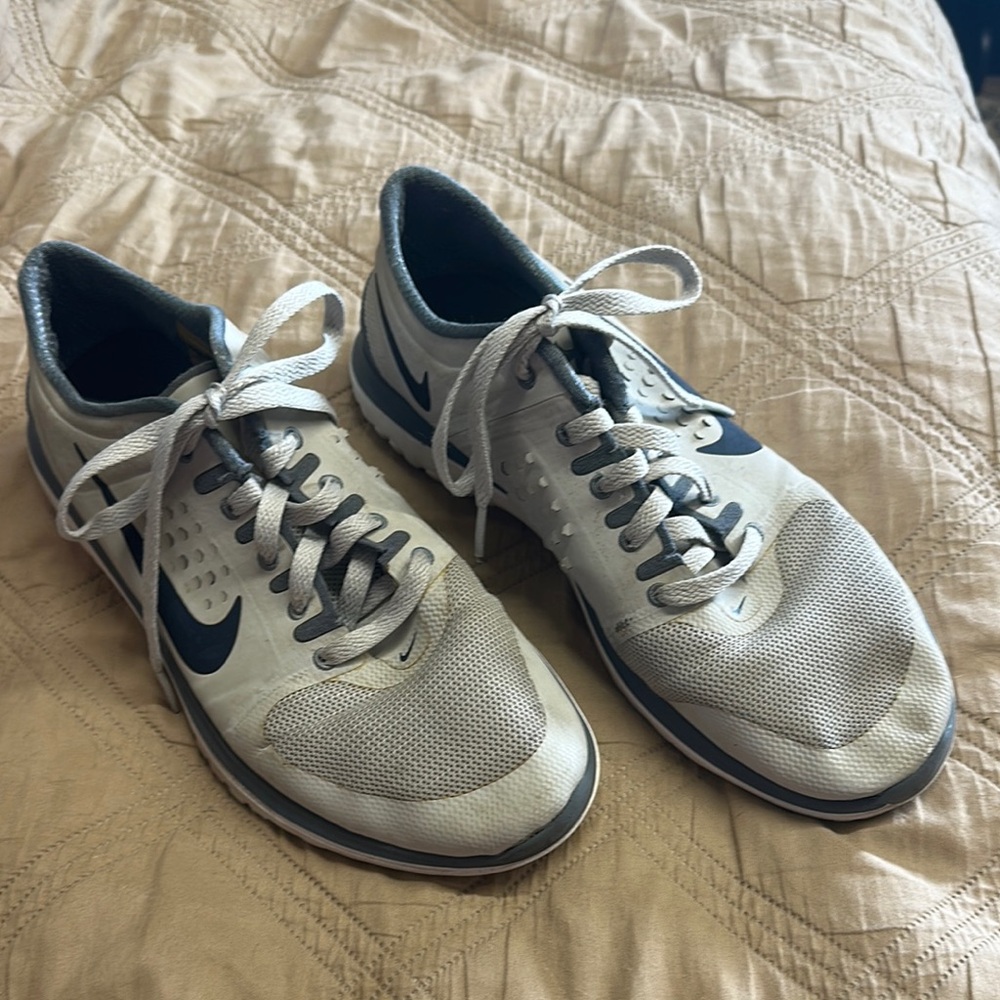 Nike White and Gray Athletic Shoes with Low-Top Design